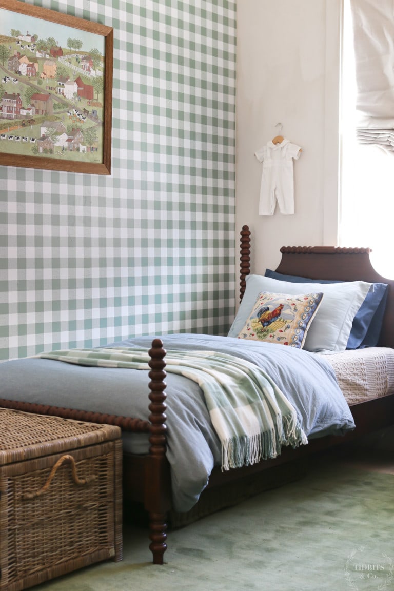 A duvet, pillows and blankets layered on a cozy bed