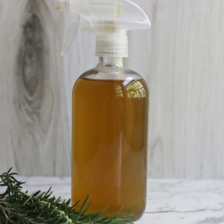 A bottle of rosemary hair water