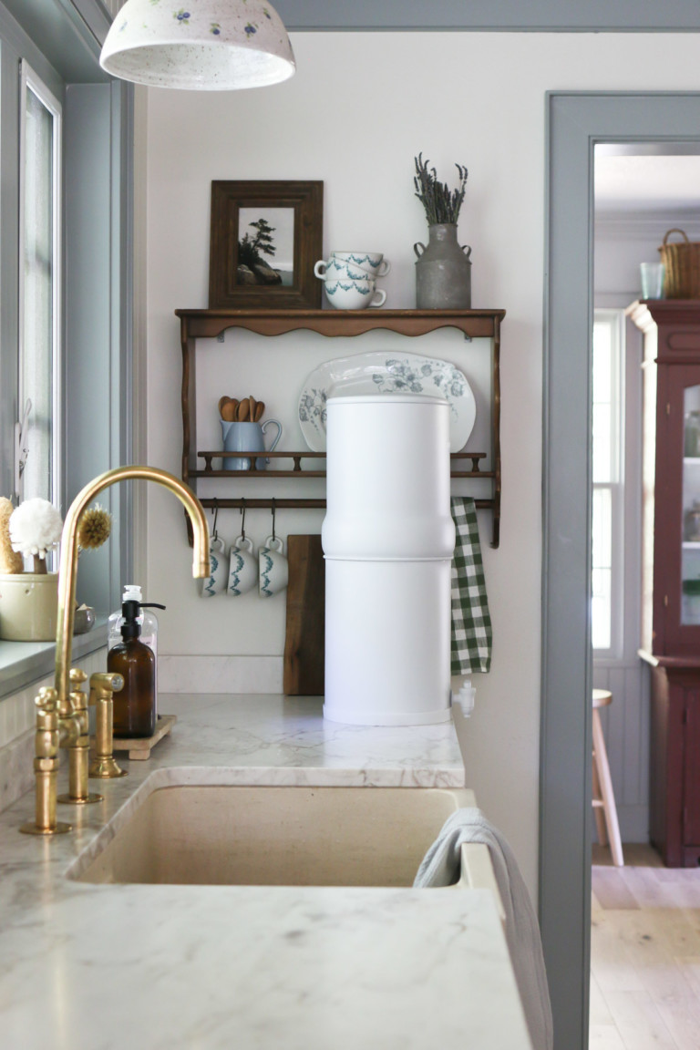 A BOROUX water filter rests on a countertop in a cottage home