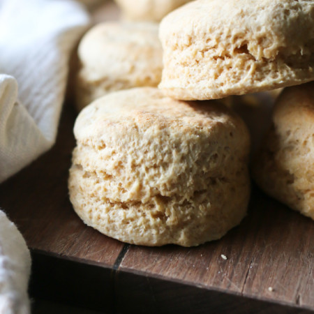 A pile of several biscuits made using a recipe with freshly milled flour