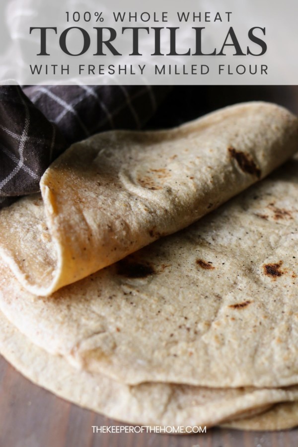 A pile of homemade tortillas made with freshly milled whole grain flour