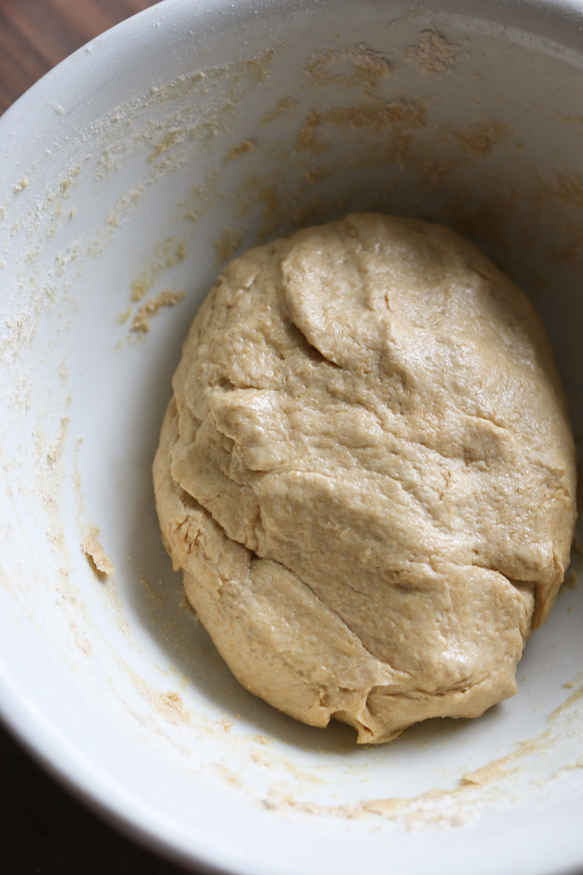 A mixing bowl holds tortilla dough made from freshly milled 100% whole wheat flour