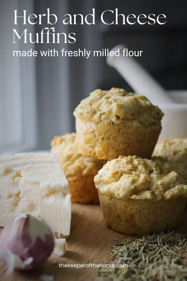 A stack of several homemade muffins made with cheese, herbs and fresh milled flour